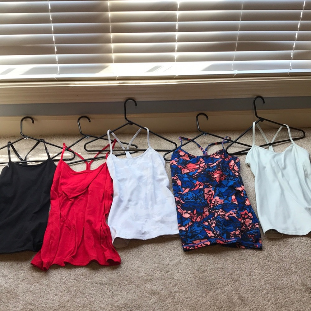Variety of lululemon Power Y tanks. Vary in sizes 4-8.